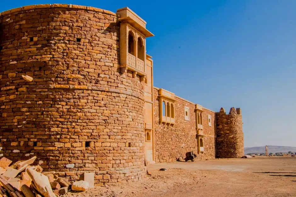 Capture of the ancient Khaba Fort amidst the arid landscapes of Jaisalmer, India.
